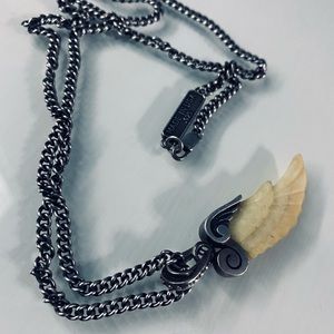 KING BABY CARVED FOSSILIZED IVORY WING PENDANT